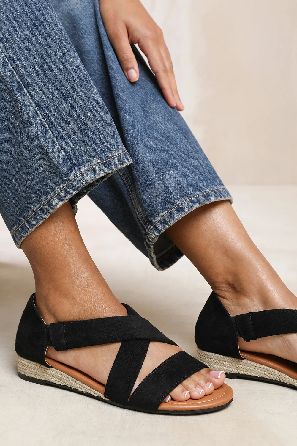 HUMMINGBIRD WIDE FIT LOW WEDGE SHOES WITH CROSS OVER STRAP IN BLACK SUEDE