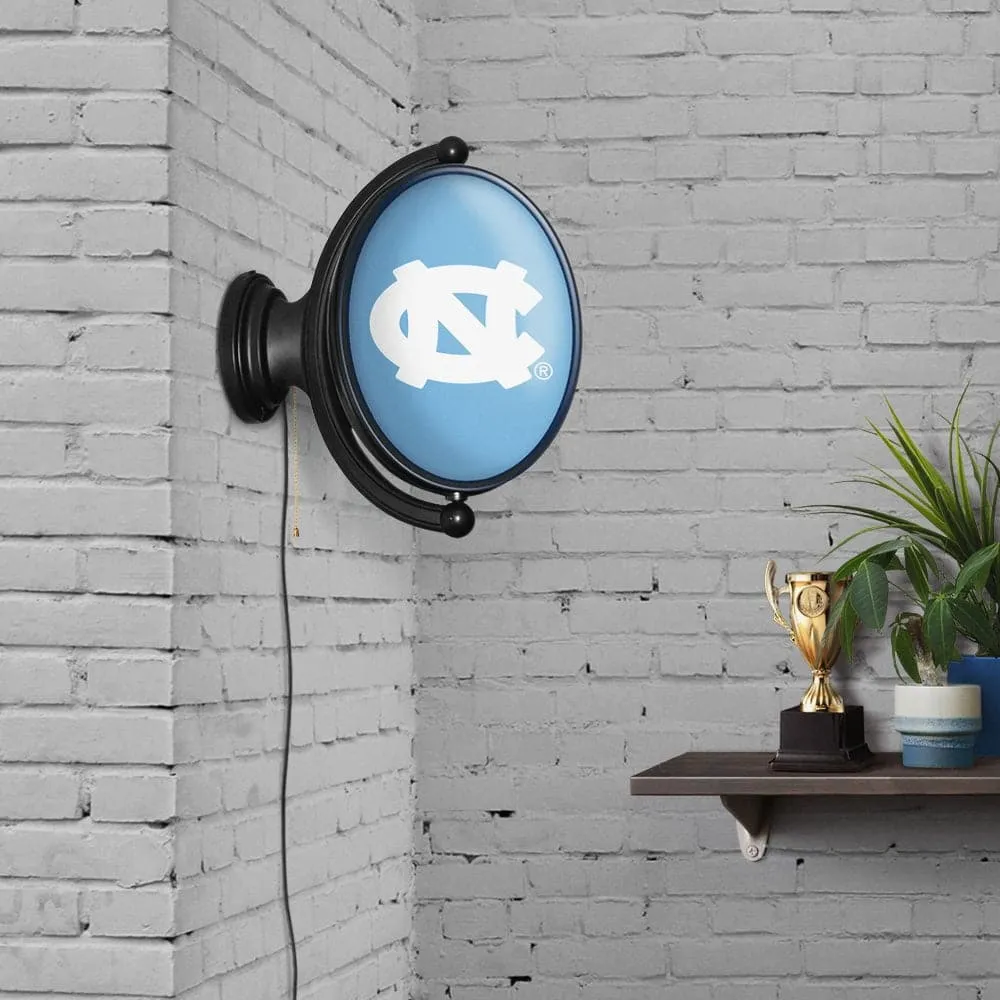 North Carolina Tar Heels: Original Oval Rotating Lighted Wall Sign