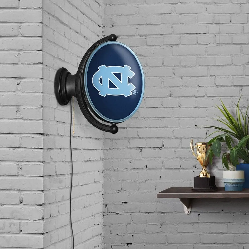 North Carolina Tar Heels: Original Oval Rotating Lighted Wall Sign