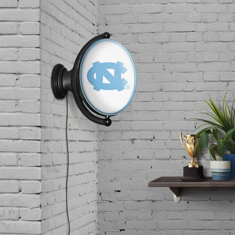 North Carolina Tar Heels: Original Oval Rotating Lighted Wall Sign